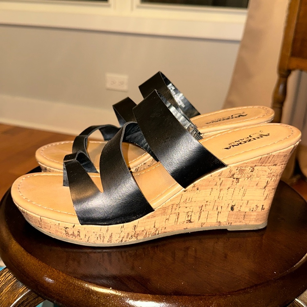 Black wedge sandals.